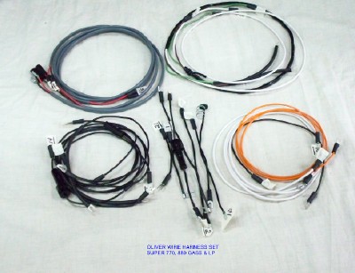 We now offer a brand new Wiring harness kit for Oliver Super 77 Gas and LP.

Cotton braided to look original; Terminals are soldered and sealed. Includes: Headlight wires and diagram.