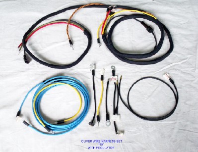 We now offer a brand new Wiring harness kit for Oliver 99.

Cotton braided to look original; Terminals are soldered and sealed. Includes: Headlight wires and diagram.